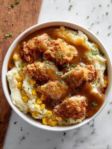 Mashed Potato Bowl with Chicken Nuggets, Corn, Cheddar and Mozzarella Cheese, and Brown Gravy Recipe