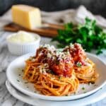 Melt-In-Your-Mouth Herb-Infused Meatballs in Tomato Sauce Recipe