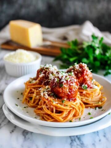 Melt-In-Your-Mouth Herb-Infused Meatballs in Tomato Sauce Recipe
