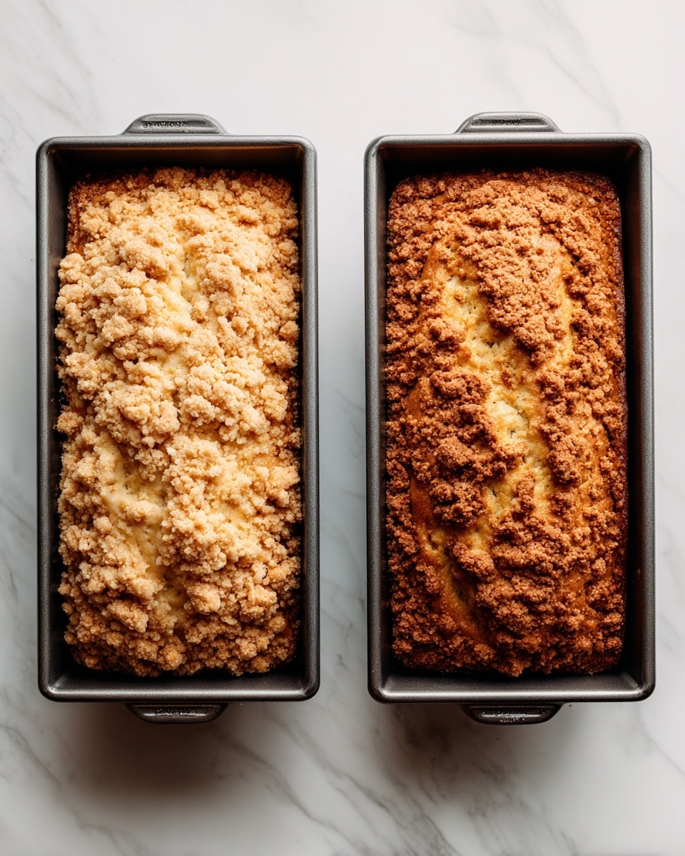 A silver metal loaf pan filled with light creamy batter spread evenly, topped with a layer of crumbly brown sugar and spice mix covering most of the batter, sitting on a white marbled surface. Next to it is the same loaf pan with the batter baked into a brown loaf with a rough textured top, the crumb topping slightly darker and spread over the center ridge, all on the same white marbled surface. photo taken with an iphone --ar 4:5 --v 7