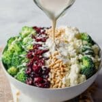 Broccoli Cauliflower Salad with Cranberries, Toasted Nuts, and Honey Lemon Dressing Recipe