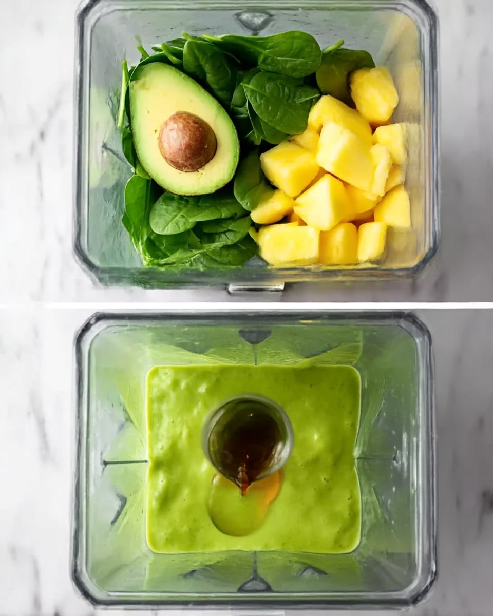 The image shows three vertical sections of a blender container placed on a white marbled surface. The top section contains fresh green spinach leaves and half an avocado with its seed removed, sitting side by side. The middle section adds many bright yellow chunks of pineapple on top of the spinach and avocado. The bottom section shows a thick, smooth green mixture filling the container, with a woman's hand pouring a small amount of dark honey or syrup into the center of the green liquid. photo taken with an iphone --ar 4:5 --v 7