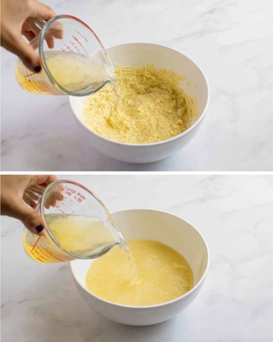 The first image shows a white bowl filled with a thick, yellowish batter that has a rough, lumpy texture. A woman's hand is pouring a clear liquid with a slight yellow tint from a glass measuring cup into the bowl, which is placed on a white marbled surface. The second image shows the same white bowl now filled with a lighter yellow liquid that looks smoother and more mixed. A woman's hand is holding a glass measuring cup above the bowl, pouring the liquid into it. Both images have a clean, bright look with the white marbled background. photo taken with an iphone --ar 4:5 --v 7