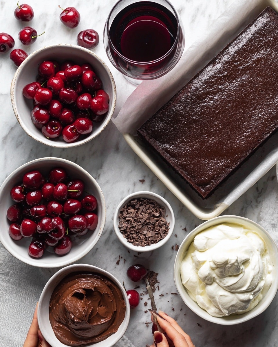A large rectangular tray of dark chocolate cake with a smooth, slightly shiny top is placed on a white marbled surface; a small square piece is taken from the cake with a woman's hand holding it. Next to the tray is a tall glass filled with dark red liquid, likely cherry juice or wine. Surrounding these are four white bowls: one filled with shiny, whole red cherries in syrup with a spoon, one with fine chocolate shavings, one with smooth and thick chocolate pudding, and one with soft, fluffy white whipped cream. Fresh whole cherries are scattered around the bowls. Photo taken with an iphone --ar 4:5 --v 7