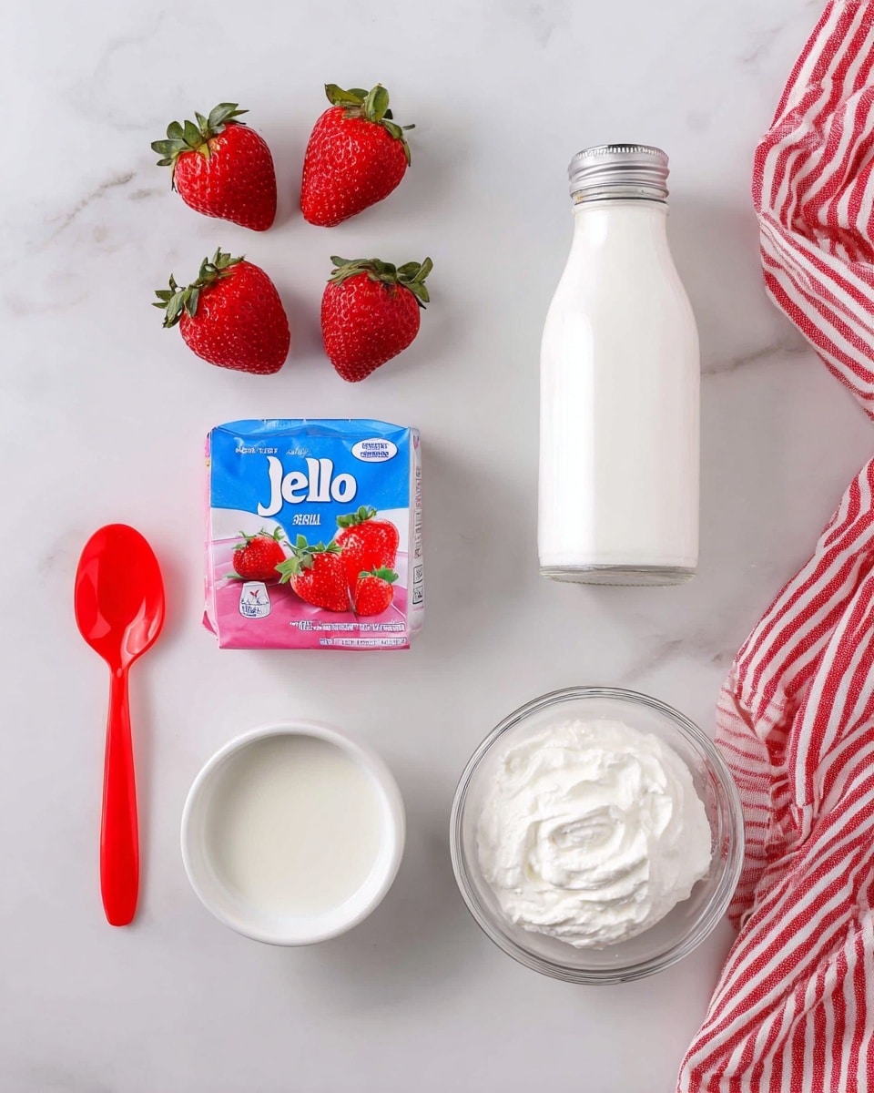 The image shows ingredients neatly arranged on a white marbled surface. There are four fresh red strawberries on the top left, next to a small blue and pink box of Jello strawberry gelatin with a picture of strawberries on it. To the right, there is a clear glass bottle filled with a white liquid and topped with a silver cap. Below the box and bottle, there are two small white bowls, one filled with thick white yogurt and the other with white whipped cream. A bright red spoon lies diagonally at the bottom left, and a red and white striped cloth is partially visible in the top right corner. Photo taken with an iphone --ar 4:5 --v 7