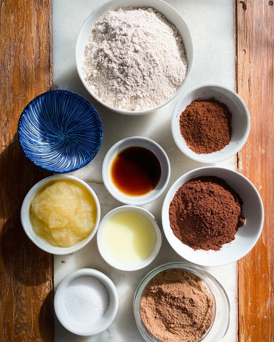 The image shows eight bowls with different baking ingredients arranged on a wooden surface replaced by white marbled texture. The largest bowl at the top center is white and filled with light brown flour. To its right is a white bowl with medium brown cocoa powder. Below that is a small white bowl with dark amber liquid. To the bottom right is a white bowl holding light yellow applesauce with a smooth, soft texture. Next to that is a small white bowl with pale yellow liquid. Below the large flour bowl to the left is a deep blue bowl with white spiral patterns containing some white salt. Above that is a small white bowl with a pile of darker brown cocoa powder. At the bottom center, a clear glass bowl holds light brown sugar with a coarse texture. The ingredients form a loose circular pattern and the lighting is soft and natural. Photo taken with an iphone --ar 4:5 --v 7