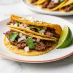 Creamy Pulled Beef Birria Tacos with Melted Oaxaca Cheese Recipe