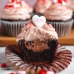 Valentine's Day Chocolate Cupcakes with Raspberry Buttercream and Candy Decorations Recipe