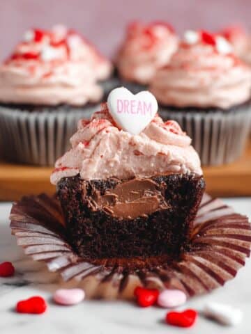 Valentine's Day Chocolate Cupcakes with Raspberry Buttercream and Candy Decorations Recipe