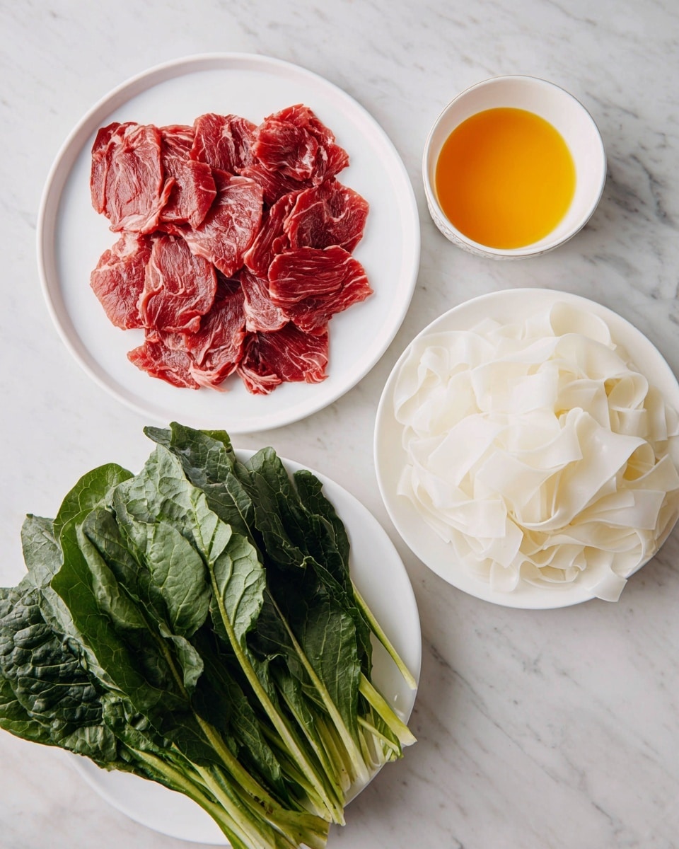 The image shows four white dishes on a white marbled surface. On the left, a white plate holds multiple thin slices of raw dark red meat with some marbling. Above it is a small white bowl filled with a bright orange-yellow liquid, smooth in texture. To the right, a white plate has a pile of folded, wide flat white rice noodles with a soft, slightly translucent look. At the bottom, another white plate is filled with a bunch of fresh dark green leafy vegetables with thick stems, loosely piled. The scene is bright and clean, with ingredients neatly arranged. photo taken with an iphone --ar 4:5 --v 7