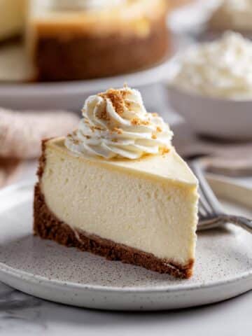 Eggnog Cheesecake with Gingersnap Crust and Nutmeg Whipped Cream Recipe