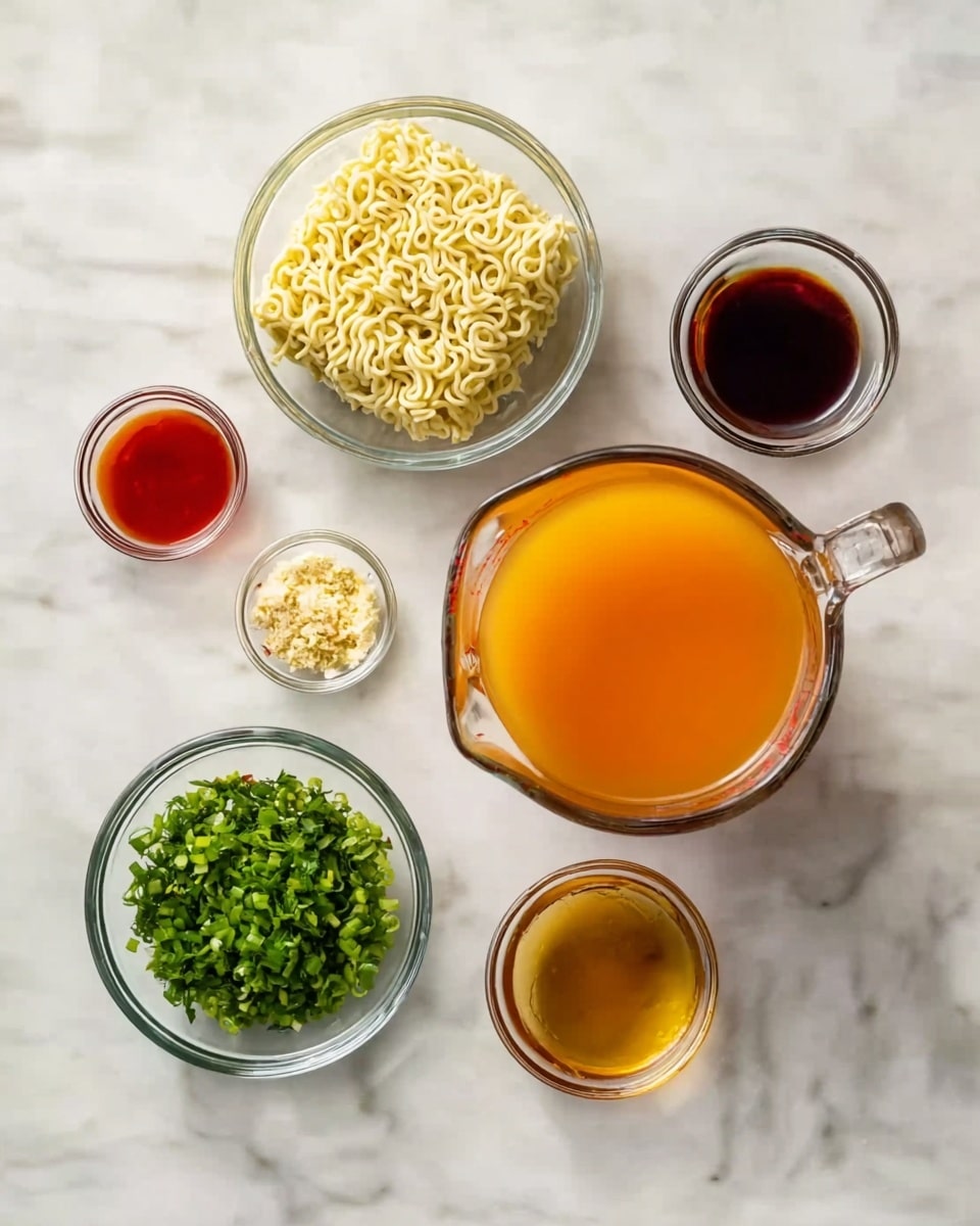 A white marbled surface holds seven clear glass containers with different ingredients arranged neatly: in the center bottom is a small bowl with fresh green chopped herbs, to its left is a larger bowl with a block of dry, pale yellow instant noodles, and below the herbs is a small bowl with minced light yellow garlic. At the top center is a glass measuring jug filled with bright orange broth, to its right is a small bowl with dark brown soy sauce. On the far left are two tiny bowls, one with red chili oil and the other with light brown sesame oil, all items spaced evenly creating a clean and organized look. Photo taken with an iphone --ar 4:5 --v 7
