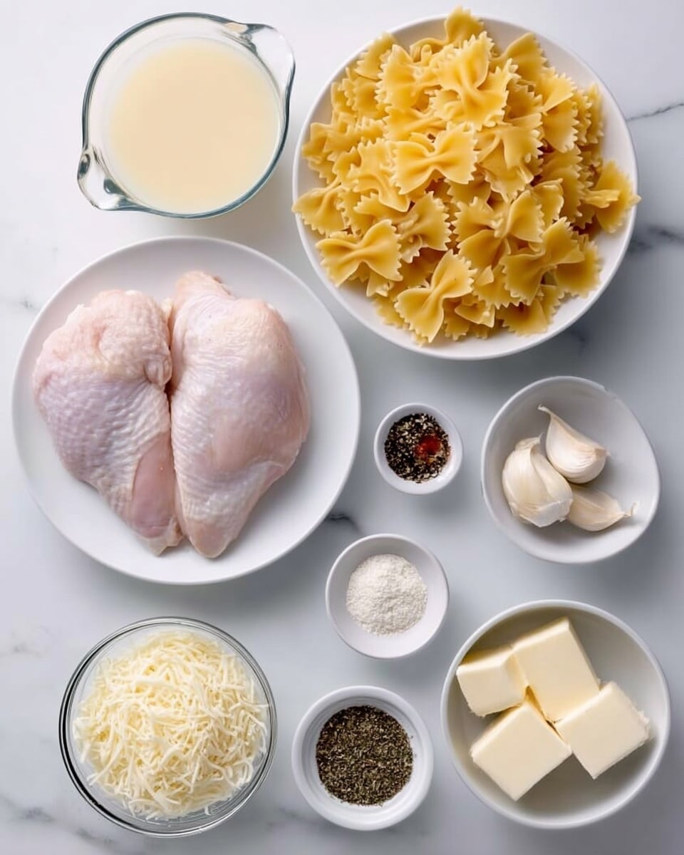 The image shows a white plate with two raw chicken pieces, placed near the center on a white marbled surface. Above it, there is a white bowl filled with yellow farfalle pasta, with its bow-tie shape visible. To the left, there are two clear measuring cups, one filled with a pale yellow chicken stock and the other with white heavy cream. Below the measuring cups, a small white bowl filled with shredded parmesan cheese is visible. To the right of the chicken plate, there is a small white bowl containing three light beige garlic cloves. Surrounding the garlic, small white bowls hold spices: ground nutmeg in a clear bowl, dried Italian seasoning herbs, white salt, dark black pepper, crushed black pepper, and small cubes of butter in a clear bowl, all arranged neatly around the main ingredients. The whole setup sits on a white marbled surface. Photo taken with an iphone --ar 4:5 --v 7