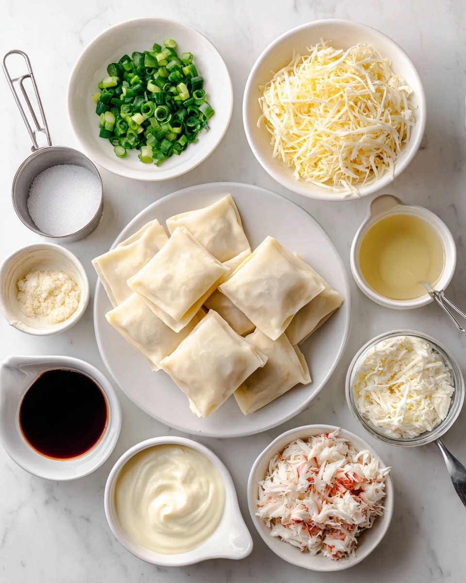 The image shows a top view of several small white dishes and a small white measuring cup placed on a white marbled surface. In the center, there is a white plate with square wonton wrappers that are pale beige and smooth. Surrounding this plate are small white bowls containing bright green chopped green onions, shredded pale yellow Monterey Jack cheese, white cream cheese cubes, finely minced pale yellow garlic, and shredded white and reddish imitation crab meat. Also visible are a small bowl of white granulated sugar, a metal cup of creamy white mayonnaise, a small bowl of dark brown soy sauce, and a white measuring cup filled with light golden frying oil. Everything is neatly arranged and the colors stand out clearly against the white marbled background. Photo taken with an iphone --ar 4:5 --v 7