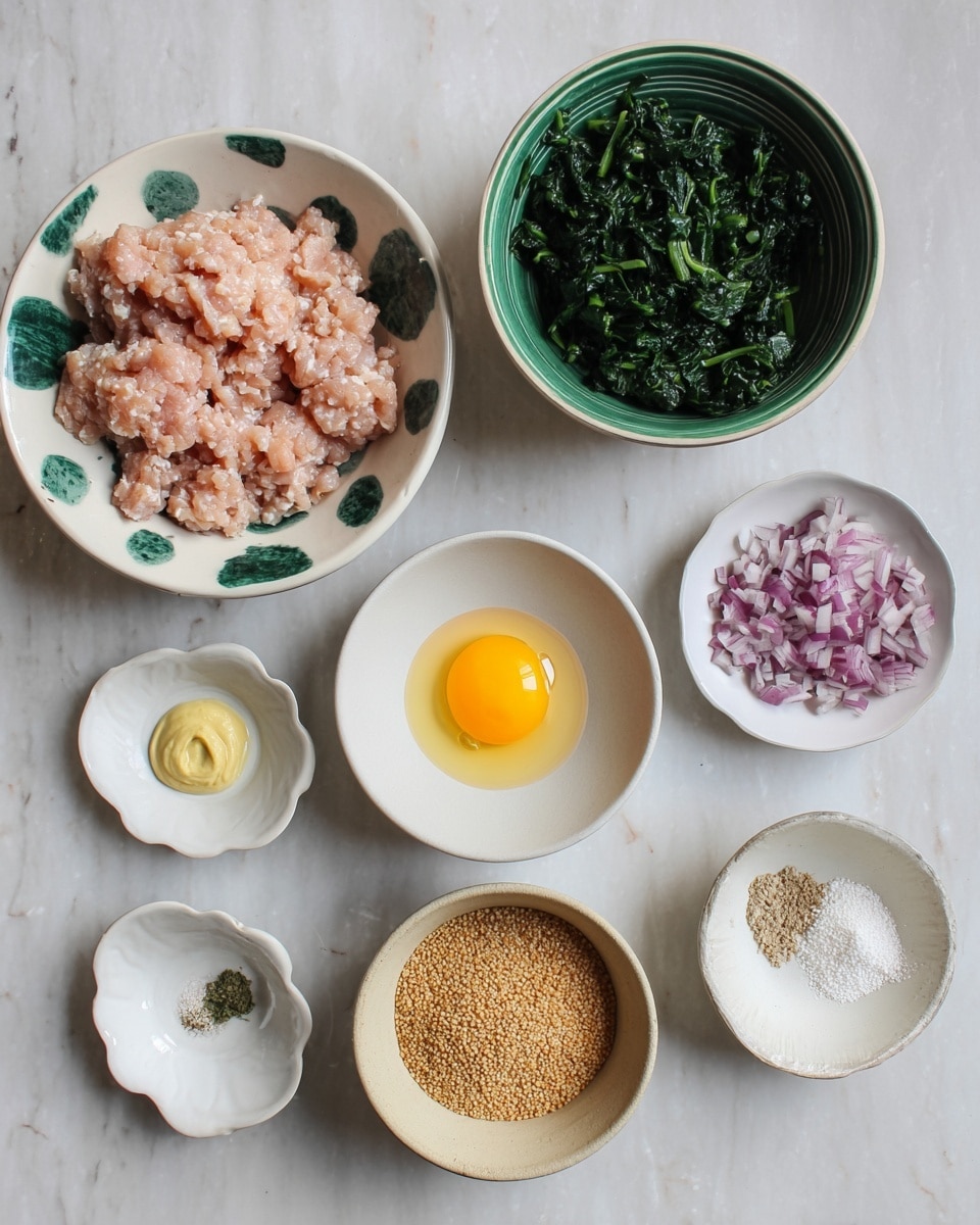 Several white bowls with green spots hold different ingredients on a white marbled surface. One large bowl is filled with light pink minced chicken, and a medium bowl contains dark green chopped spinach. A green-rimmed bowl holds finely chopped purple onions. There is a small white bowl with a whole raw egg showing the bright yellow yolk and clear egg white. Two small white scalloped bowls have seasonings: one with pale mustard yellow paste, the other with small piles of white salt, black pepper, and beige garlic powder. A beige bowl contains light brown breadcrumbs. The photo taken with an iphone --ar 4:5 --v 7