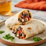 Creamy Black Bean Burritos with Cheese and Cilantro Recipe