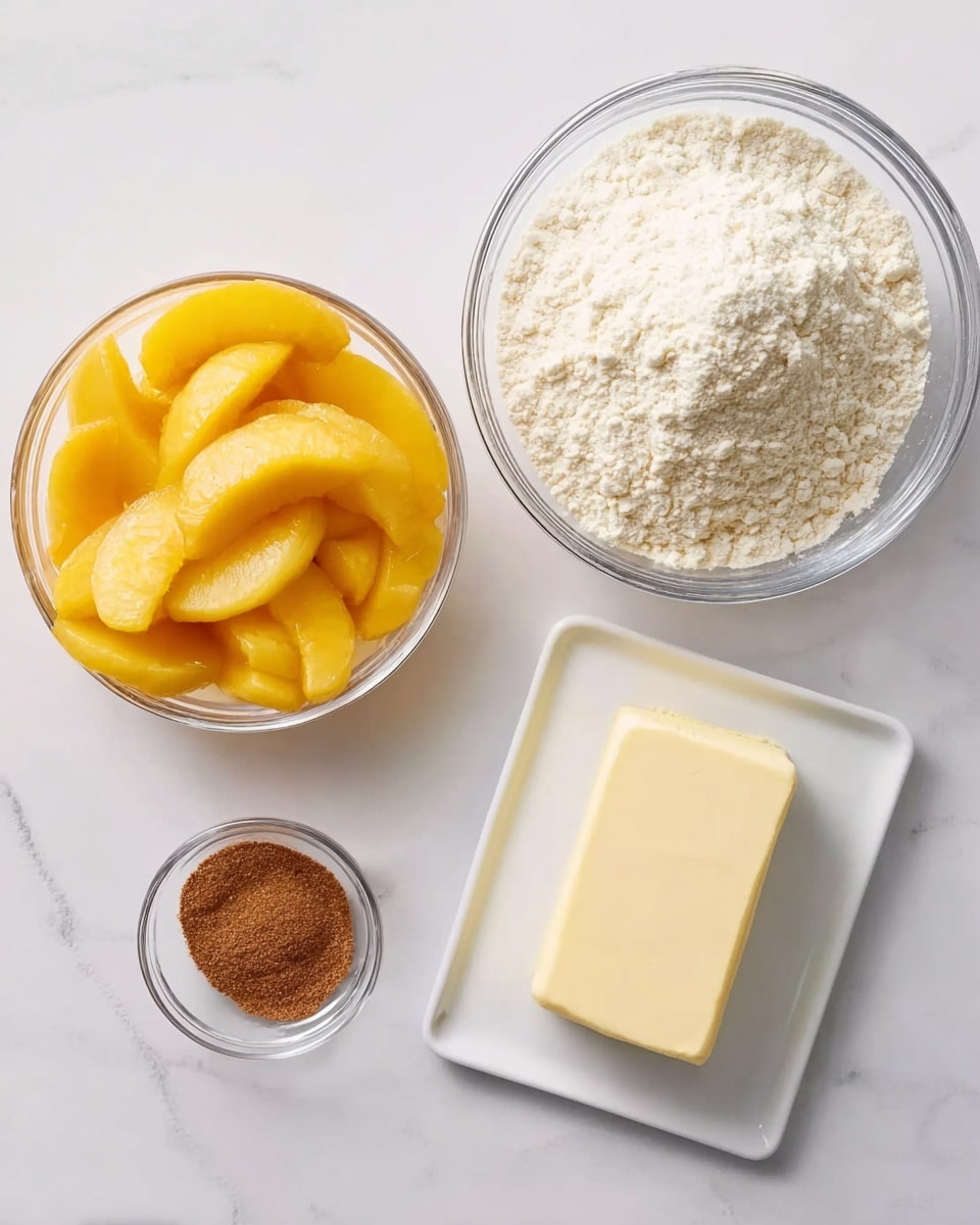 The image shows four bowls and plates arranged on a white marbled surface. On the top right, there is a large clear bowl filled with white flour with a soft, powdery texture. Below it to the right, a rectangular white plate holds a solid block of pale yellow butter. To the left, a large clear bowl contains bright yellow sliced peaches with a shiny and smooth texture. Above the bowls, a small clear round bowl holds a small amount of brown cinnamon powder with a fine, grainy texture. The composition is clean and organized, emphasizing the ingredients individually. Photo taken with an iphone --ar 4:5 --v 7