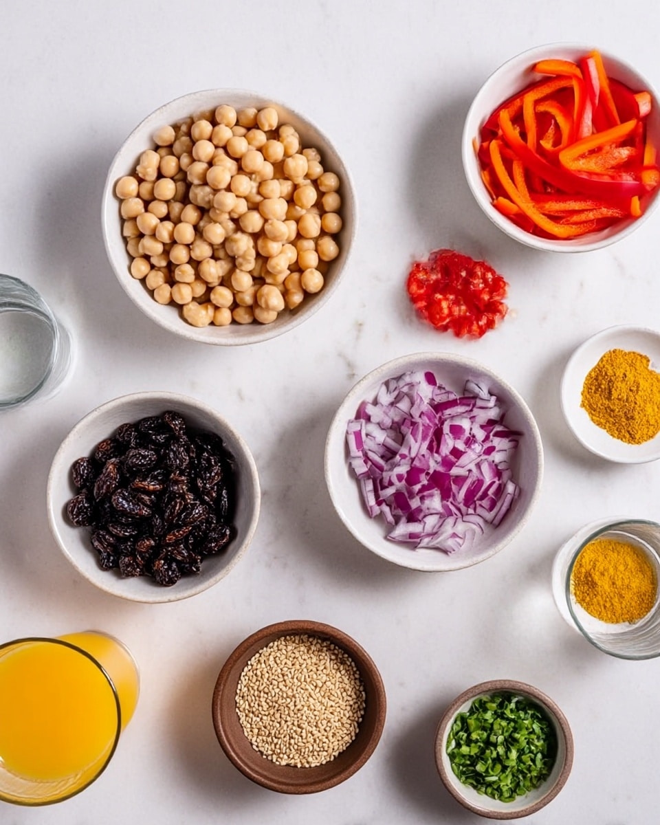 The image shows a white marbled surface with several small white bowls arranged in a circular pattern. There is a bowl filled with light beige chickpeas, another with dark brown raisins, a bowl with thin orange-red strips of bell pepper, and a bowl of finely chopped purple onion. Nearby, there is a white bowl with small red tomato pieces and a small white dish with yellow powdered spices. In the middle, there is a bowl holding tan sesame seeds, and a small brown bowl with green chopped herbs. A small glass of clear water and a glass of orange juice sit on the surface, adding to the colorful and fresh look. photo taken with an iphone --ar 4:5 --v 7