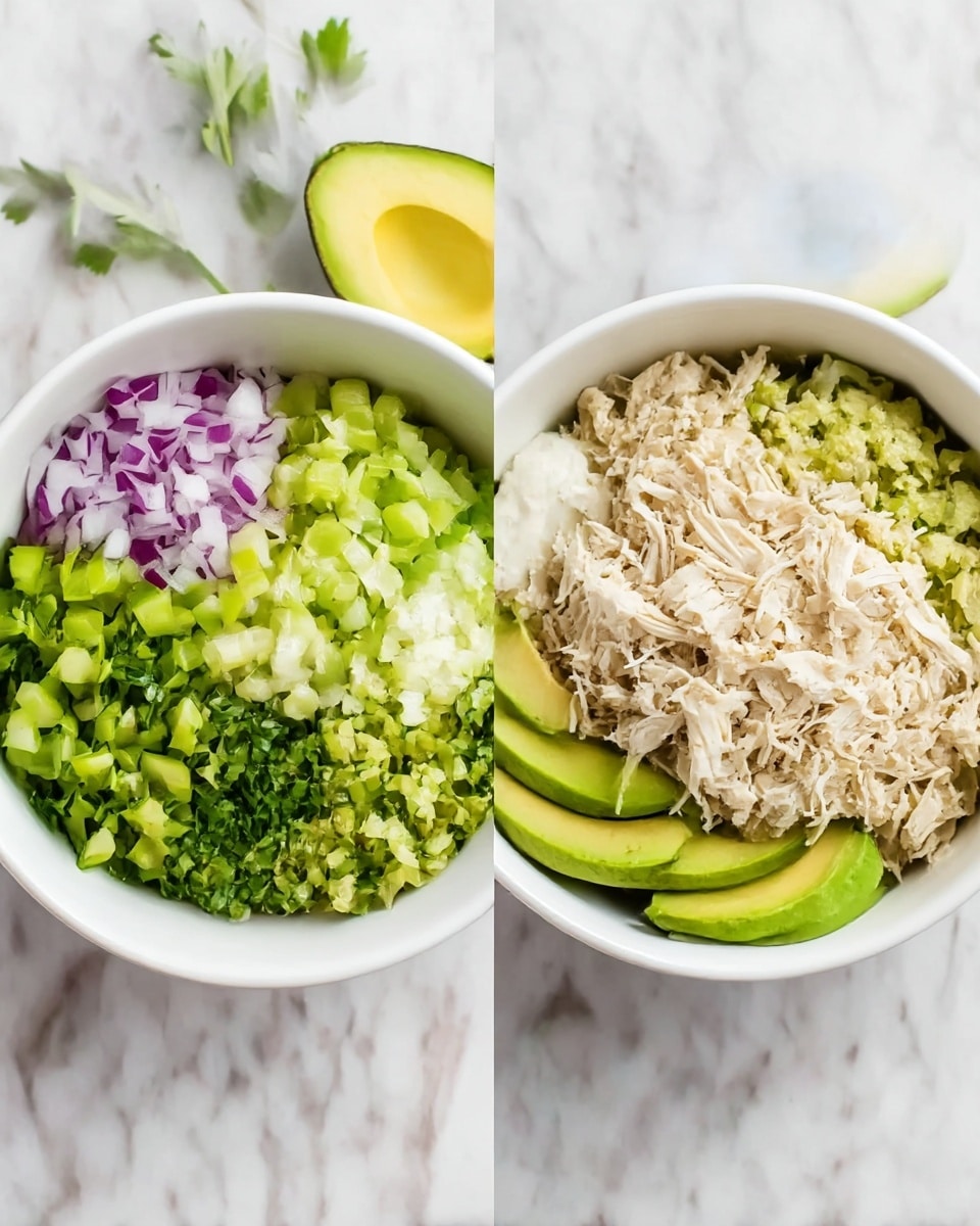 The image shows two white bowls on a white marbled surface with fresh vegetables around them. The first bowl has five layers: on the left side, finely chopped purple onion; next to it, bright green chopped celery; in the center, chopped green herbs; a smooth white sauce layer on the right side; and slices of green avocado on the bottom, slightly overlapping the other ingredients. The second bowl is layered, starting with a mix of the avocado and herbs at the bottom, covered fully by a thick layer of shredded light-colored cooked chicken on top. Photo taken with an iphone --ar 4:5 --v 7