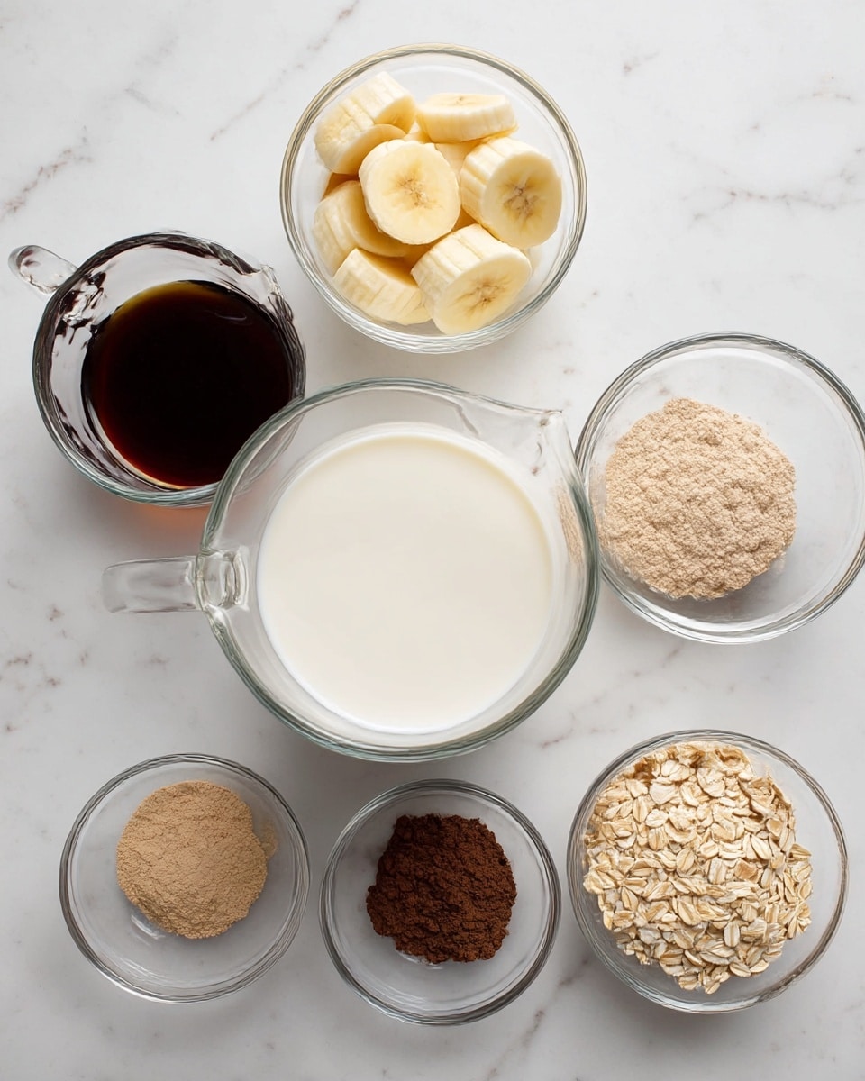 The image shows seven clear glass bowls and pitchers arranged on a white marbled surface. In the center is a large glass pitcher filled with white milk. To the left of it is a smaller glass pitcher filled with a dark brown liquid, likely maple syrup. Above the milk pitcher is a glass bowl filled with slices of peeled banana, yellow with soft texture. Around the bananas, there are five smaller glass bowls: top left holds light tan powder, top right contains darker brown cocoa powder, middle right has a small amount of cinnamon-colored powder, and bottom right holds light beige rolled oats. The arrangement is neat, with each ingredient clearly visible. photo taken with an iphone --ar 4:5 --v 7