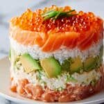 Layered Sushi Cake with Salmon, Crab, and Avocado Recipe