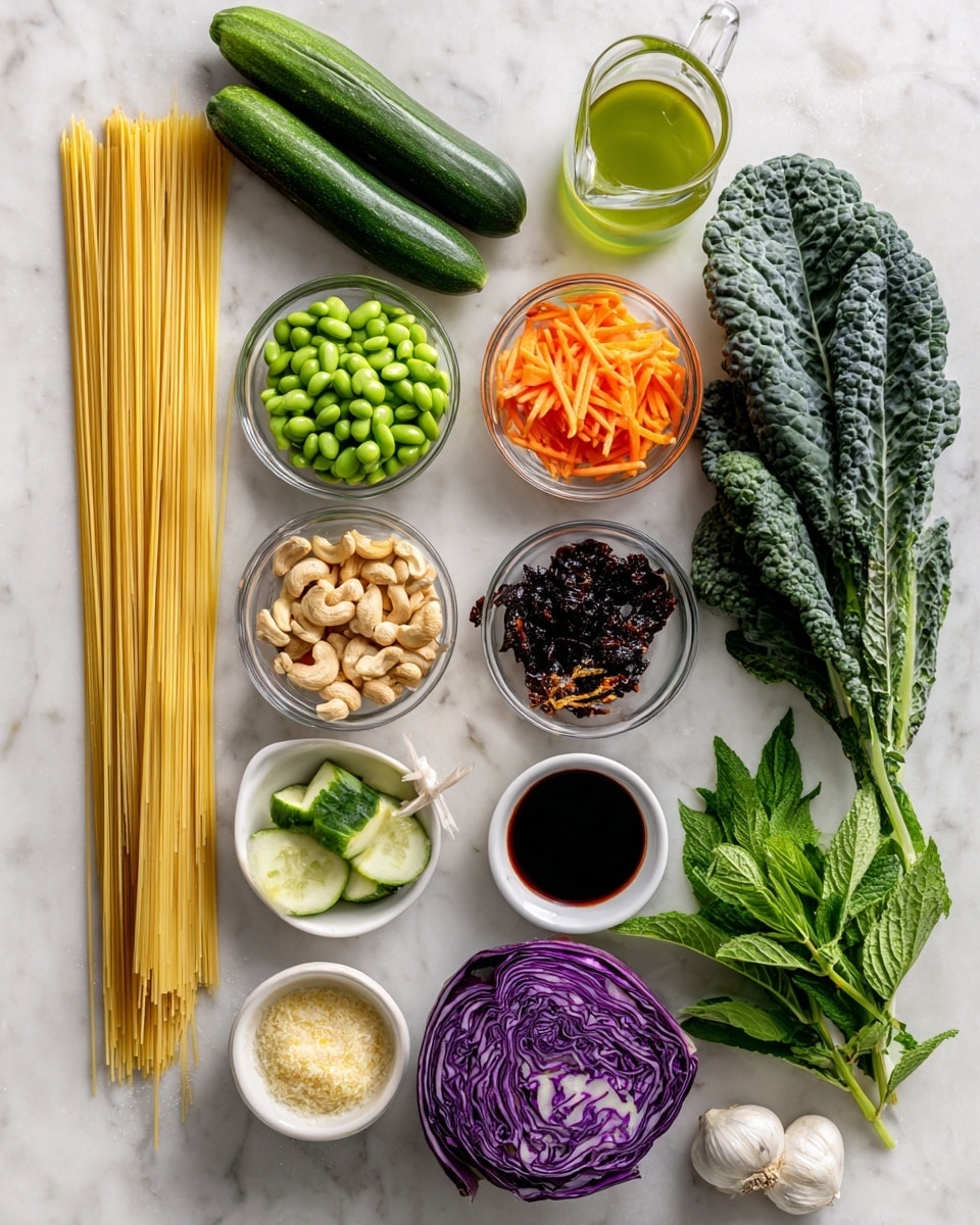 The image shows an assortment of fresh and colorful ingredients arranged neatly on a white marbled surface. On the left side, a bundle of pale yellow thin spaghetti lies flat vertically, next to three medium green cucumbers placed side by side. Below them, there is a whole spherical purple cabbage. Several small clear glass bowls are scattered around the middle area: one filled with bright green edamame, another with thin bright orange julienned carrots, one with light brown roasted cashews, one with pale brown brown sugar, one with pale yellow lime juice, and a small bowl holding fresh grated ginger in pale beige color. A clear measuring jug contains light greenish avocado oil, and a small white bowl has a dark soy and hoisin sauce mixture. Near the top right corner, there are two white garlic cloves and a small bowl with dark red chili crisp. Fuller green Tuscan kale leaves with a textured surface extend vertically on the right side next to a bunch of fresh green herbs, including green onions, cilantro, mint, and basil, all adding vibrant leafy textures. photo taken with an iphone --ar 4:5 --v 7