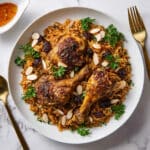 Creamy Chicken and Rice Kabsa with Almonds and Raisins Recipe